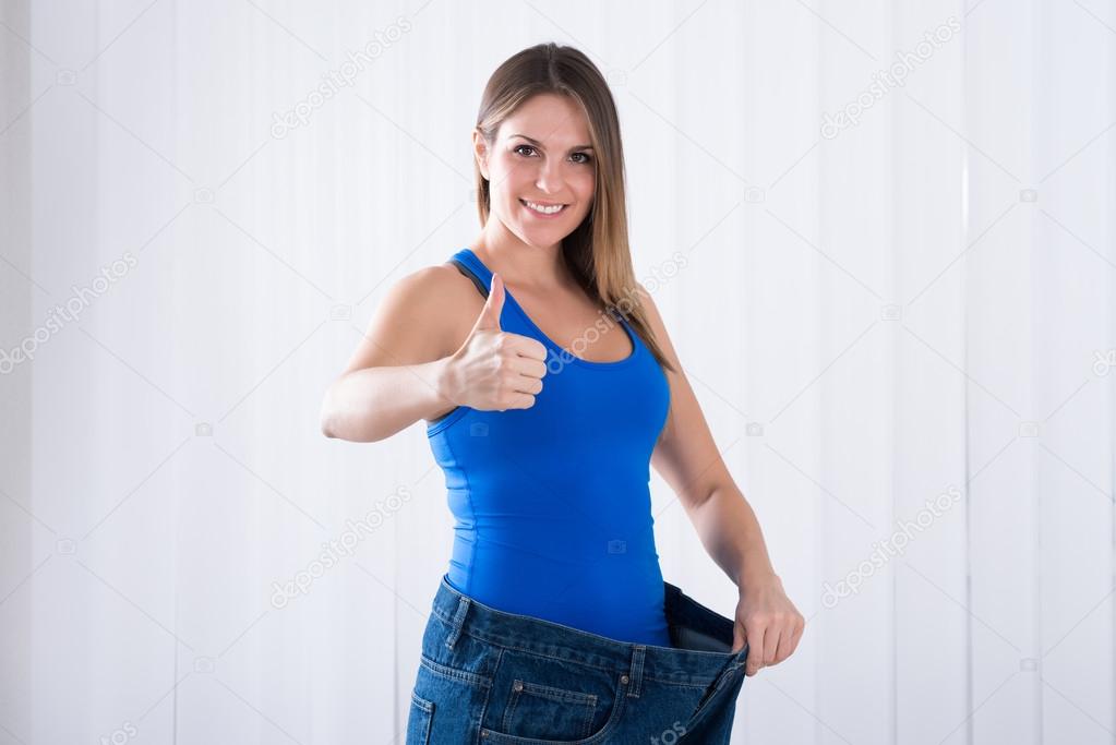 Woman Showing Weightloss