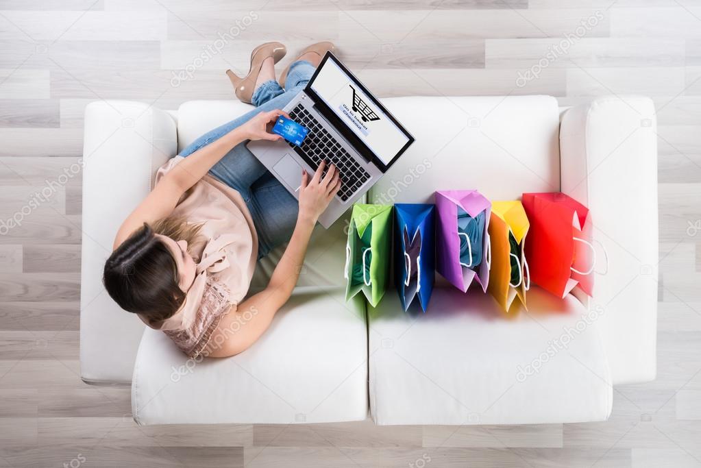 Woman Shopping Online On Laptop