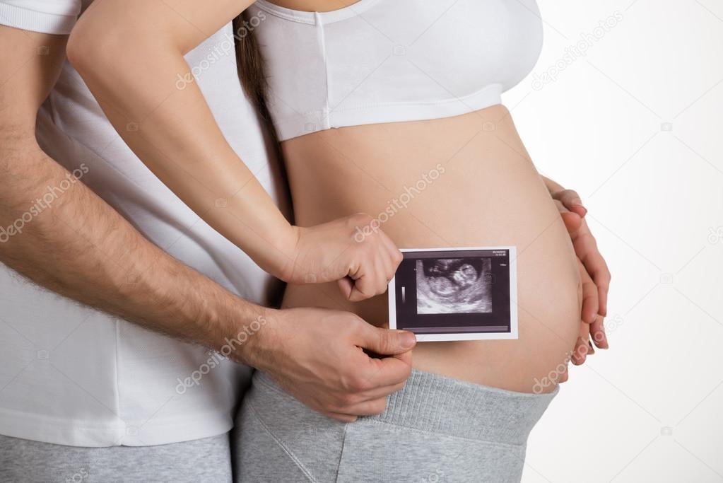 Expecting Couple with Ultrasound X-ray