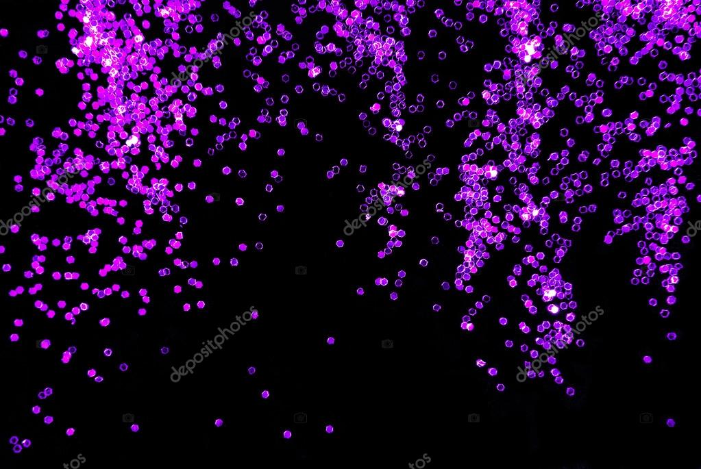 Purple glitter sparkle on black background — Stock Photo © severija