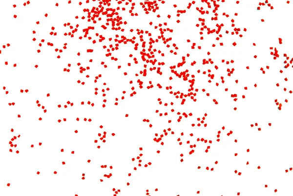 Roter Glanz fällt vereinzelt auf Weiß — Stockfoto