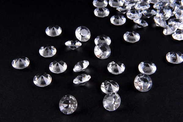 Diamonds on black background — Stock Photo, Image