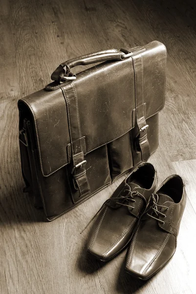 Classic style briefcase and leather shoes