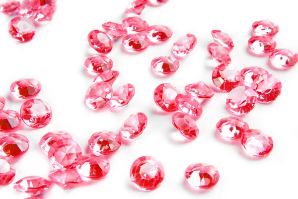 Diamantes vermelhos sobre fundo branco — Fotografia de Stock