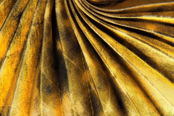 Golden pleated fabric texture — Stock Photo, Image