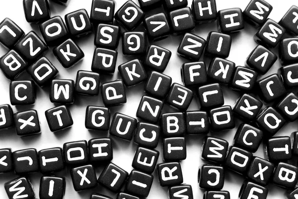 Black letters background — Stock Photo, Image