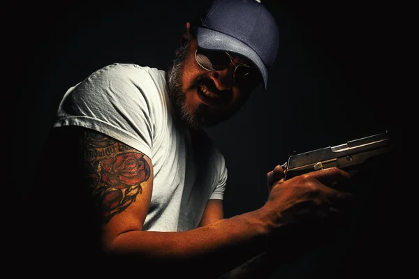 Tatuagem e pistola — Fotografia de Stock