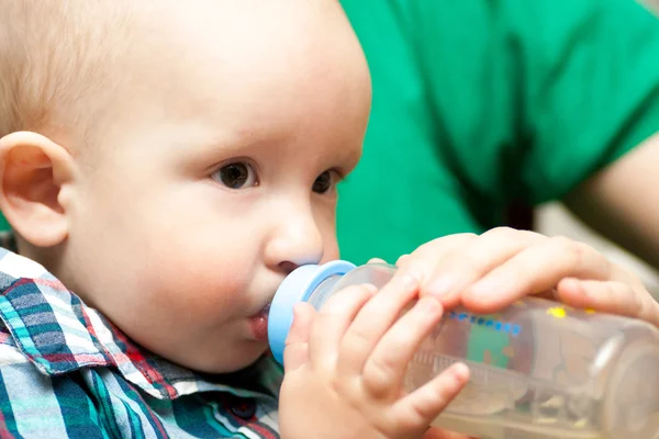 Baby drinking — Stock Photo, Image