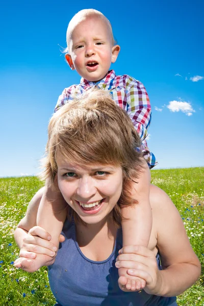 Child and his mother Stock Picture