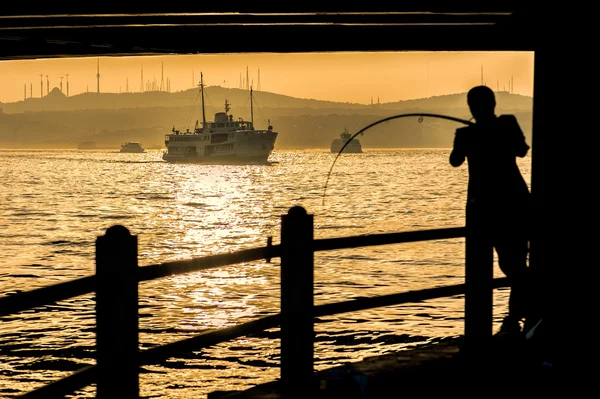 Fishermen on sunset — Stock Photo, Image