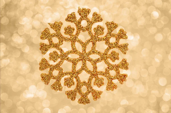 Golden snowflake background — Stock Photo, Image