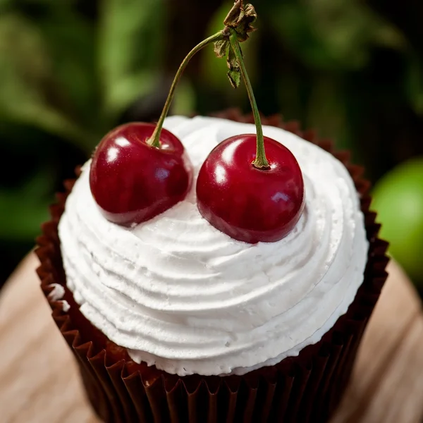 Cupcake with cherries — Stock Photo, Image