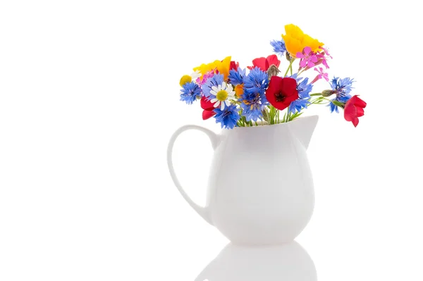 Wildflowers in jug — Stock Photo, Image