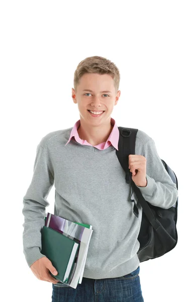 Teenage boy with a backpack and school books — Stock Photo, Image