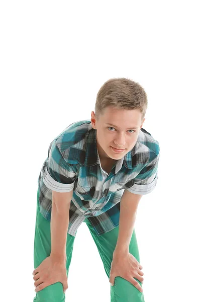 Adolescente menino se curvando para a frente — Fotografia de Stock