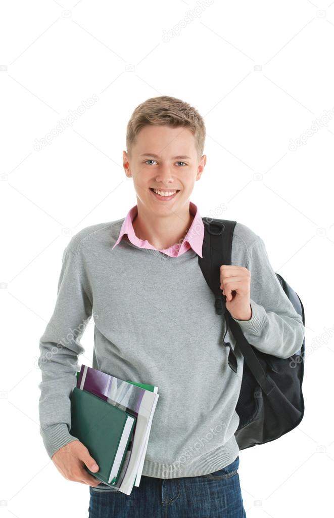 Teenage boy with a backpack and school books