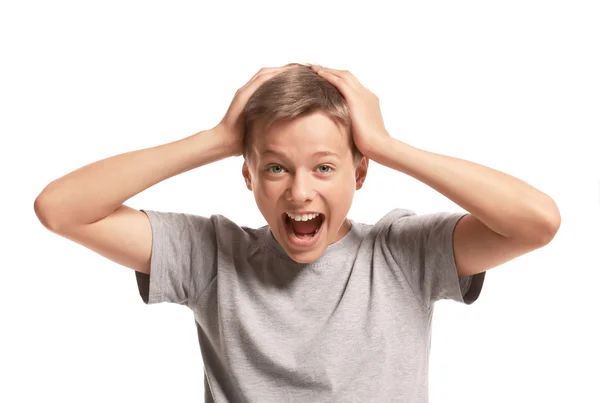 Stupito adolescente tenendo la testa — Foto Stock