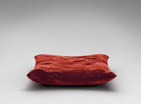 Красная бархатная подушка с вырезкой — стоковое фото
