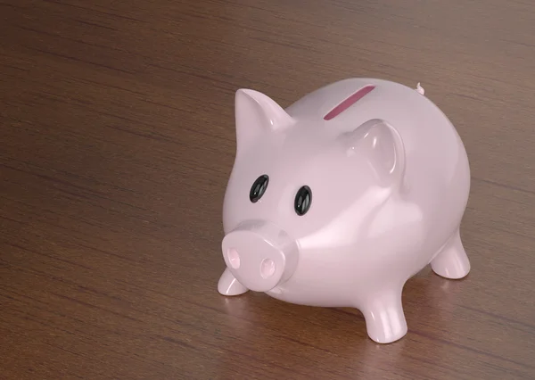 Piggy bank na tle drewniane — Zdjęcie stockowe