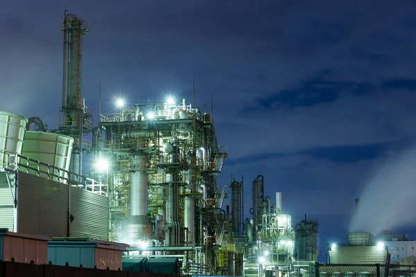 Industrial buildings at large factory at night — Stock Photo, Image