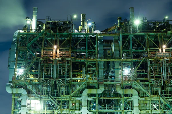 Industrial buildings at large factory at night — Stock Photo, Image