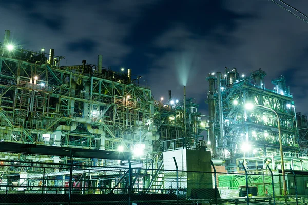 Industrial buildings at large factory at night — Stock Photo, Image