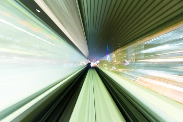 Speedy train passing through the city — Stock Photo, Image