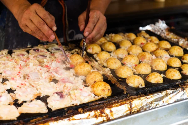 Person making of tako yaki — Stock Photo, Image