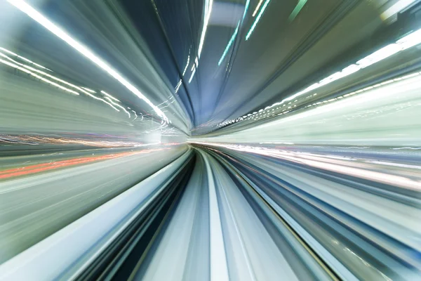 Speedy train passing through the city — Stock Photo, Image