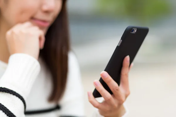 Woman read the message on cellphone