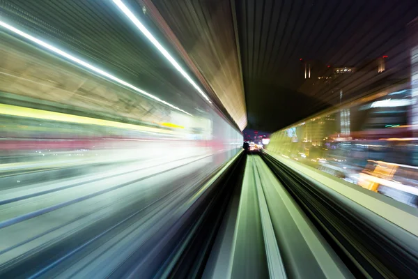 Train moving fast inside tunnel — Stock Photo, Image