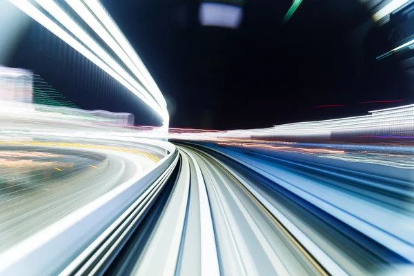 Train moving fast inside tunnel — Stock Photo, Image