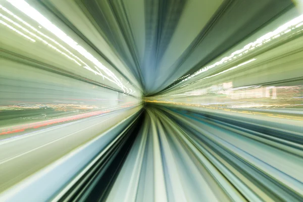 Train moving fast inside tunnel — Stock Photo, Image