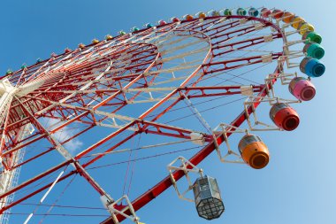 Big ferris wheel in amusement park clipart