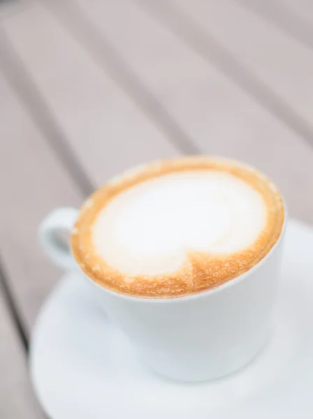 White cup of latte coffee — Stock Photo, Image