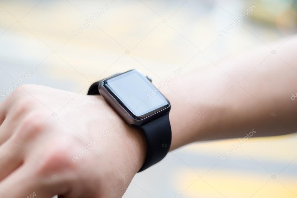 Man using wearable smart watch