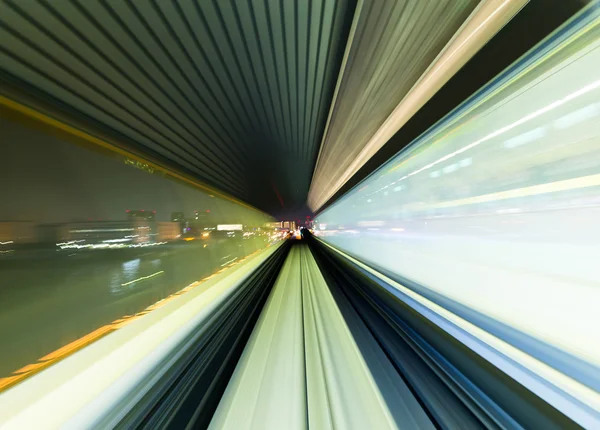 Automated guideway train at night — Stock Photo, Image