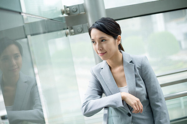 Young asian businesswoman in business suit