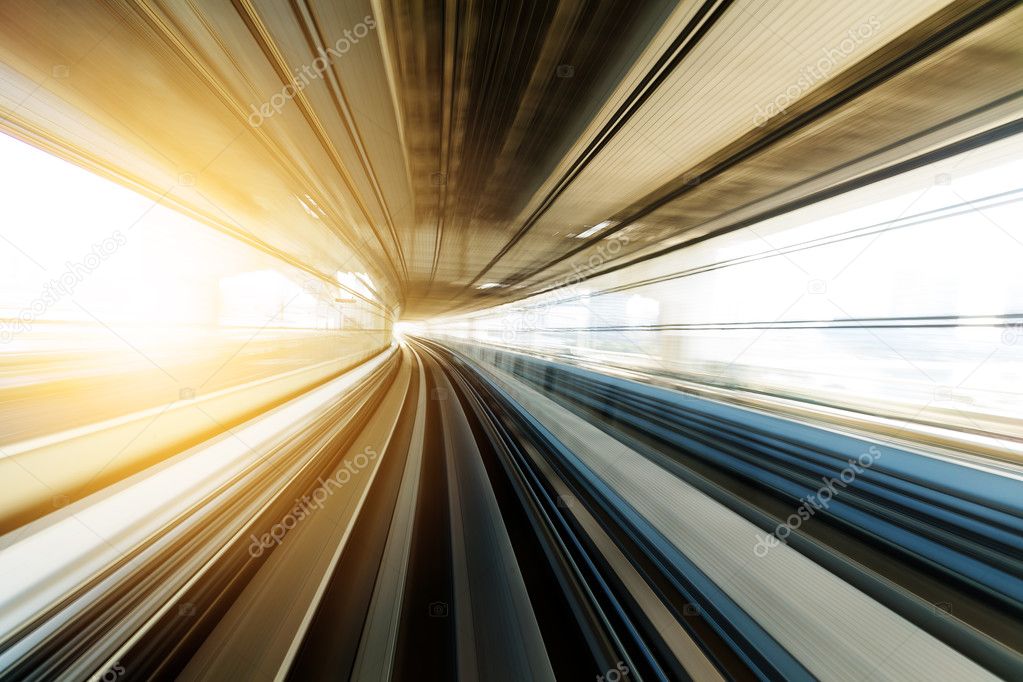 Motion blur of train moving inside tunnel 