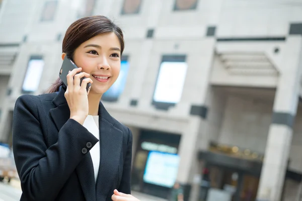 Businesswoman using smart phone — Stock Photo, Image