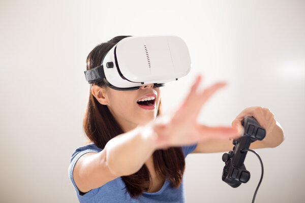 Woman with virtual reality device