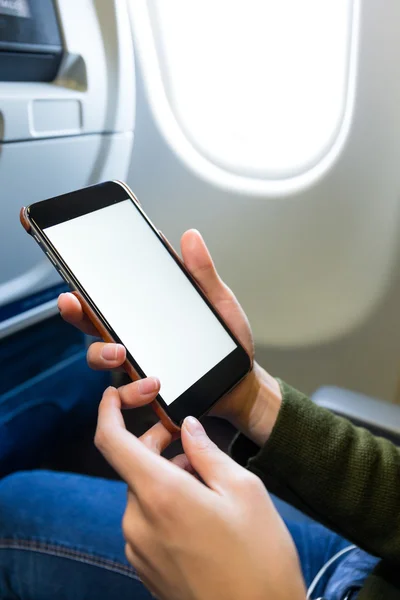 Woman holding mobile phone — Stock Photo, Image