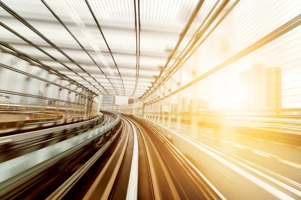 Trilha de luz do trem em movimento — Fotografia de Stock