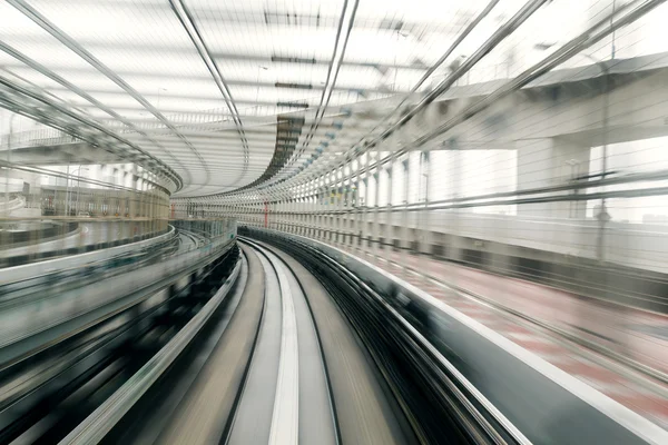 Světelné stopy pohybu vlaku — Stock fotografie