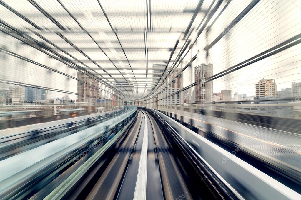 Motion blur of train moving inside tunnel in Tokyo