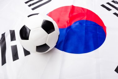 Güney Kore bayrağı ve futbol topu
