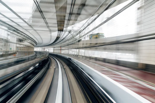 Train moving fast inside tunnel — Stock Photo, Image