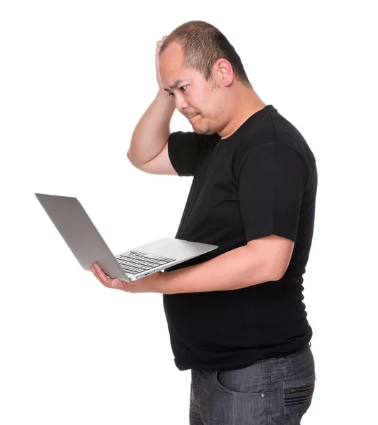 Asian man having problem on laptop computer — Stock Photo, Image