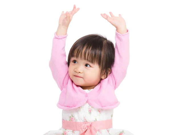 Malá dívka ruka pozvedá — Stock fotografie