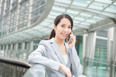 Young asian businesswoman in business suit clipart